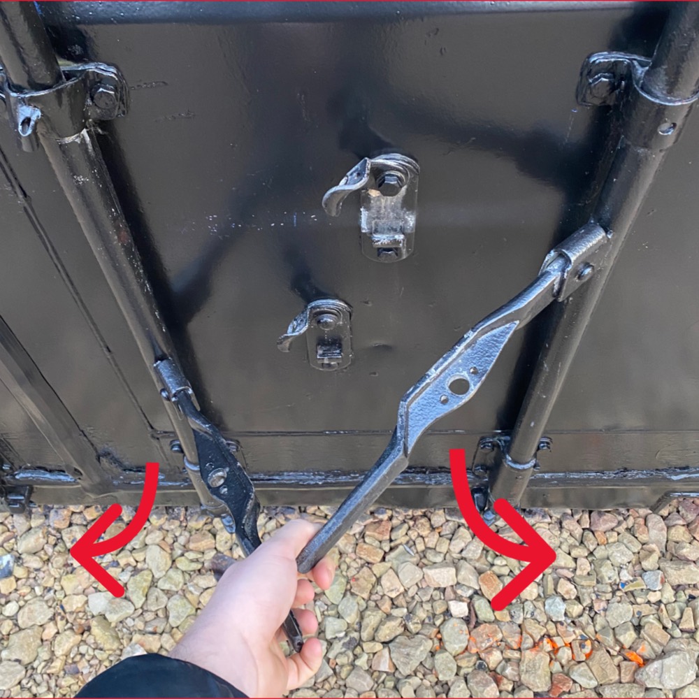Pull both handles towards you at the same time.